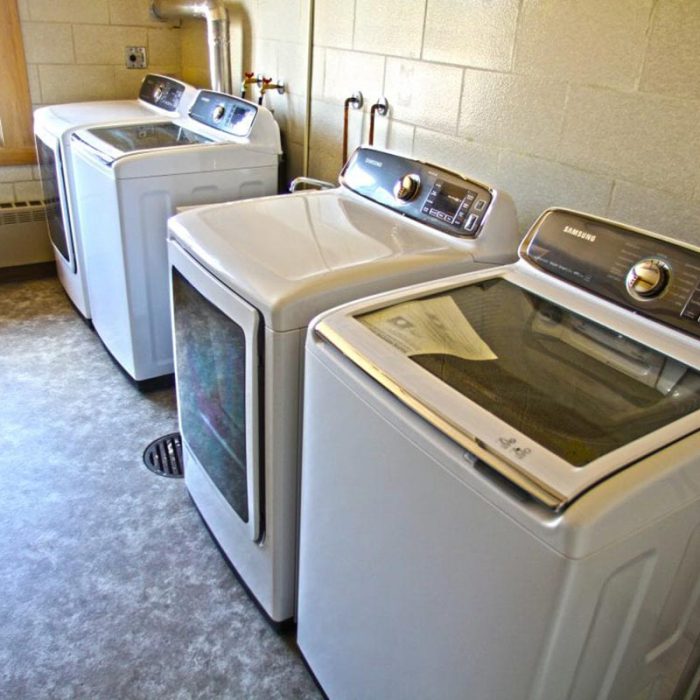 Laundry room at Fiddlers Green-Senior Living in Bad Axe, Michigan